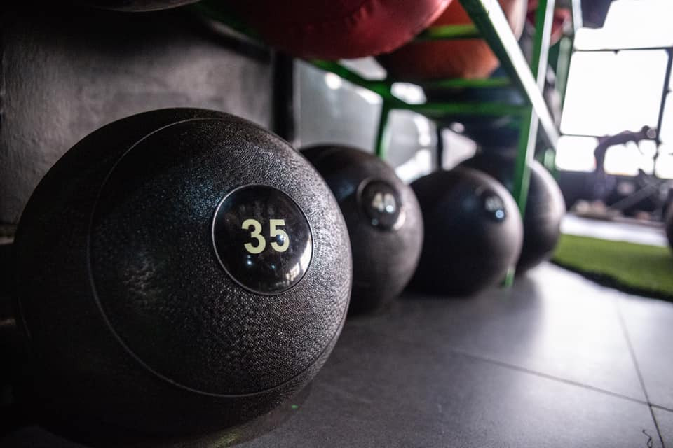 Medicine balls on the gym floor